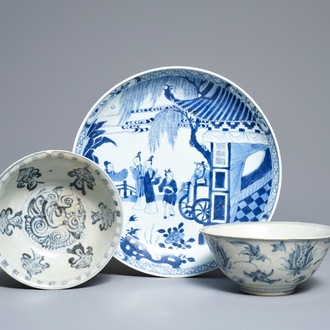 Two Chinese blue and white Ming-bowls and a plate with figures in garden, Kangxi
