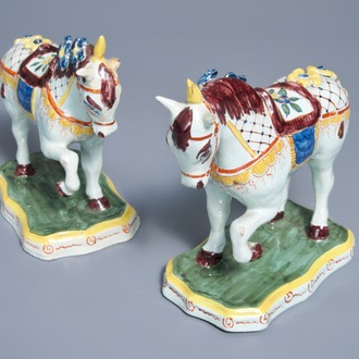 A pair of polychrome Dutch Delft models of circus horses, 19th C.