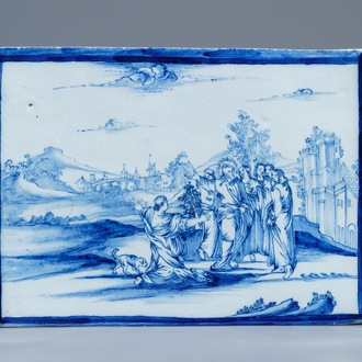 Une plaque rectangulaire en faïence de Delft bleu et blanc à sujet religieux, 18ème