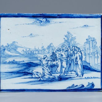 A Dutch Delft blue and white religious subject plaque, 18th C.