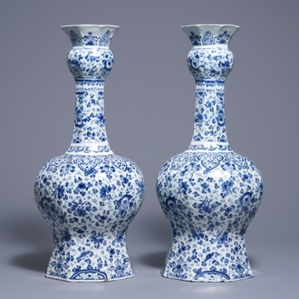 A pair of very large Dutch Delft blue and white vases, first quarter 18th C.