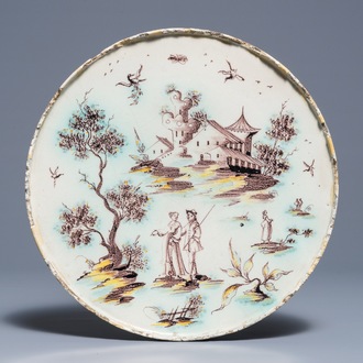 Een tazza met landschap in Italiaanse majolica, Pavia, atelier Levantino, 18e eeuw