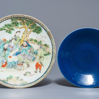 A Chinese famille verte charger and a monochrome blue dish, 19th C.