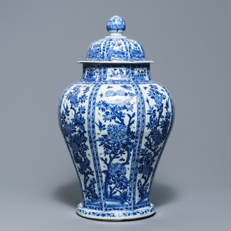 A large Chinese blue and white baluster jar and cover with floral panels, Kangxi