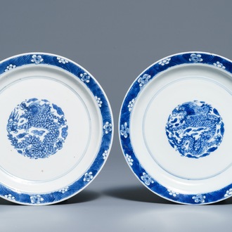 A pair of Chinese blue and white 'dragon' plates, Kangxi mark and of the period