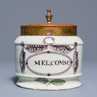 A polychrome Dutch Delft drug jar with brass lid, early 19th C.