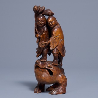 A Chinese carved bamboo group of Liu Hai and the toad, 18/19th C.