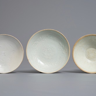 Two Chinese qingbai bowls and a plate with underglaze design, Song
