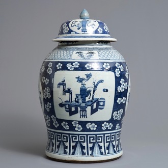 A large Chinese blue and white vase and cover with 'antiquities' design, 19th C.