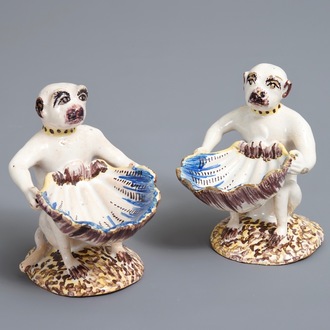 A pair of polychrome Brussels faience monkey-shaped salts, 18th C.