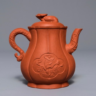 A Chinese Yixing stoneware wine jug with applied flowers and buffalo, Kangxi