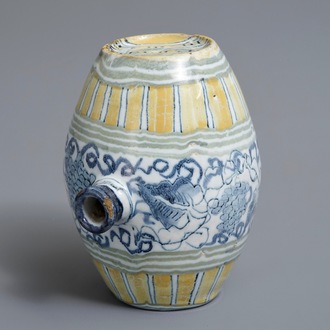 A polychrome Dutch Delft barrel-shaped gin flask with grape vines, 18th C.