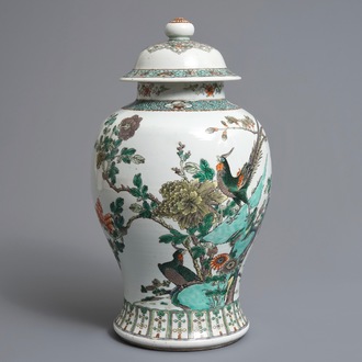 A Chinese famille verte vase and cover with pheasants and flowers, 19th C.