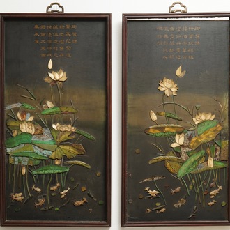 A pair of large Chinese lacquered wood inscribed panels with applied ivory, Qianlong