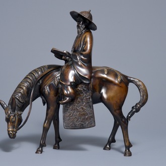 A large Japanese bronze group of a sage on horseback, Meiji, 19th C.