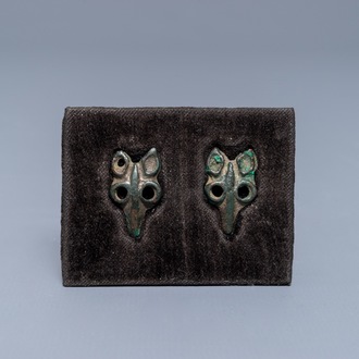 A pair of Chinese bronze ornaments, Tang