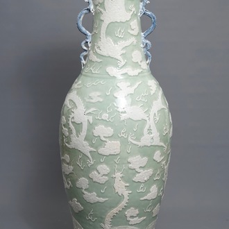 A massive Chinese relief-decorated celadon 'dragon' vase, 19th C.