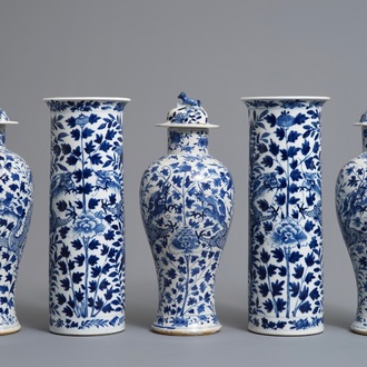 A Chinese blue and white five-piece garniture with dragons, Kangxi marks, 19th C.