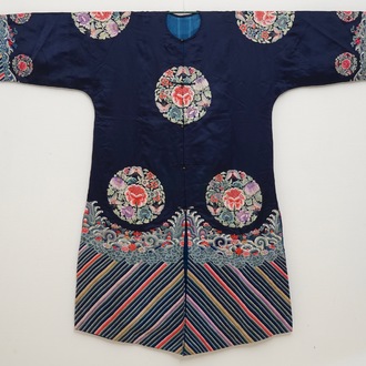 A Chinese blue ground silk informal woman's robe, 19th C.