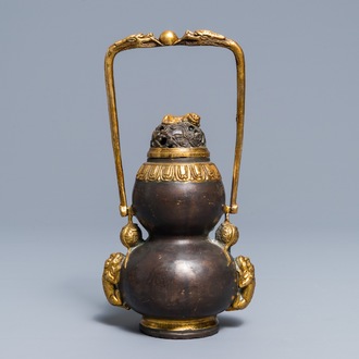Un brûle-parfum couvert en bronze partiellement doré, Chine, marque de Kangxi, Qing