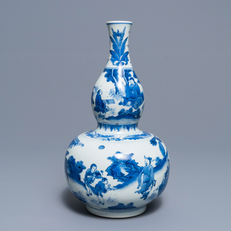 A Chinese blue and white double gourd vase, Transitional period