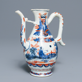 A clobbered Chinese blue and white ewer, Transitional period