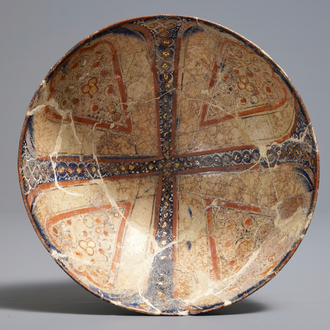 An Islamic parcel-gilt ornamental bowl, Kashan, Iran, 13th C.
