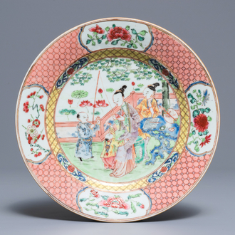 A Chinese famille rose plate with figures in a garden, Yongzheng