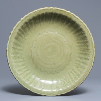 A Chinese Longquan celadon charger with incised floral design, Ming