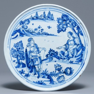 A blue and white French faience tazza with a galant scene, Nevers, late 17th C.