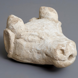 A carved stone fountain head in the shape of a buffalo, 17/18th C.