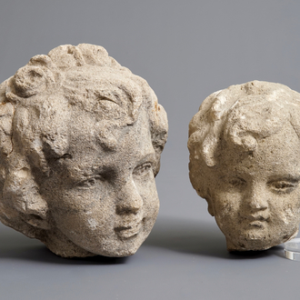 Two carved stone cherub's heads, poss. France, 17th C.