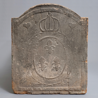A large French pottery fireplace tile with fleur-de-lis, 17th C.