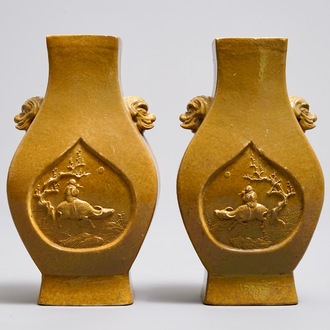 A pair of Chinese yellow glazed biscuit vases, Wang Bing Rong Zuo mark, 19th C.