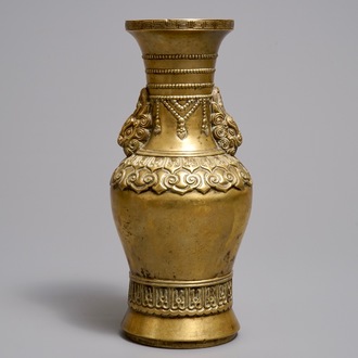 A Chinese gilt bronze vase, Xuande mark, 17/18th C.