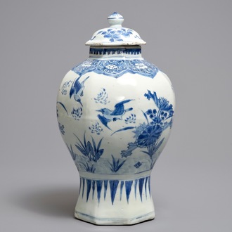 A Chinese blue and white covered vase with birds among flowers, Transitional period