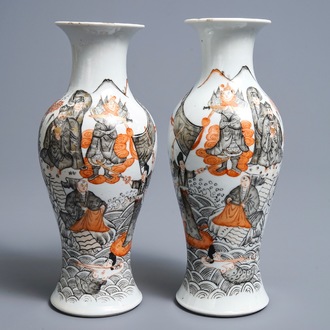 A pair of Chinese iron red, grisaille and gilt vases, Hongxian mark, 20th C.