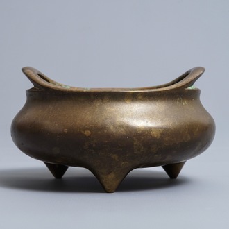 A Chinese bronze tripod censer, Xuande mark, 18/19th C.