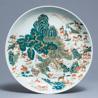 A large Chinese famille rose 'hundred deer' charger, Qianlong mark, 19th C.