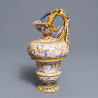 An Italian maiolica jug with grotesques, Caltagirone or Deruta, 17th C.