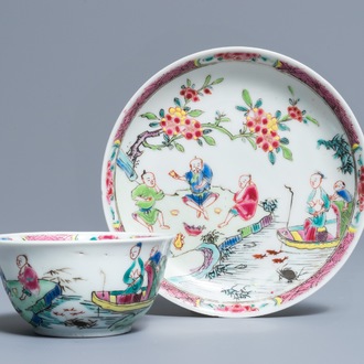 A fine Chinese famille rose cup and saucer with a river scene, Yongzheng