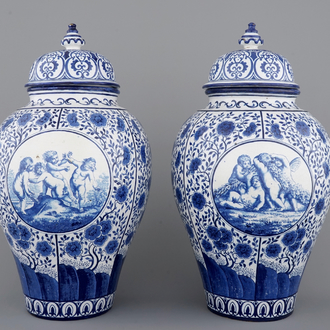 An impressive pair of blue and white Brussels faience covered vases, signed and dated 1861