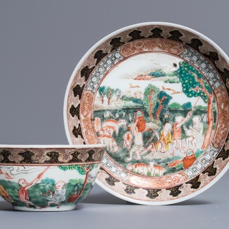 A fine Chinese famille rose 'apple pickers' cup and saucer, Yongzheng