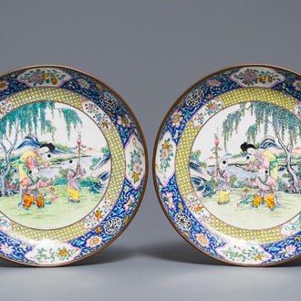 A pair of Chinese Canton enamel plates with ladies and children, Qianlong mark, 19th C.