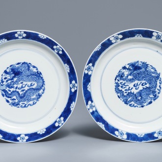 A pair of Chinese blue and white 'dragon' plates, Kangxi mark and of the period