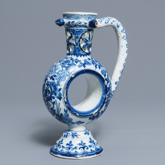 A large Dutch Delft blue and white ring-form puzzle jug, 1st quarter 18th C.