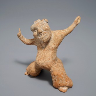 A Chinese pottery figure of a male dancer, Han