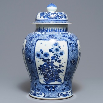 A large Chinese blue and white covered vase with floral design, Kangxi