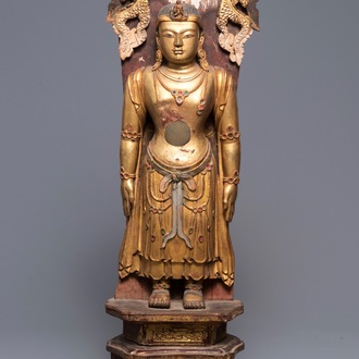 A large Chinese gilt and painted wood figure of Buddha, 19th C.