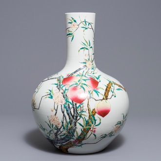 A Chinese famille rose ‘nine peaches’ tianqiu ping vase, Qianlong mark, 20th C.